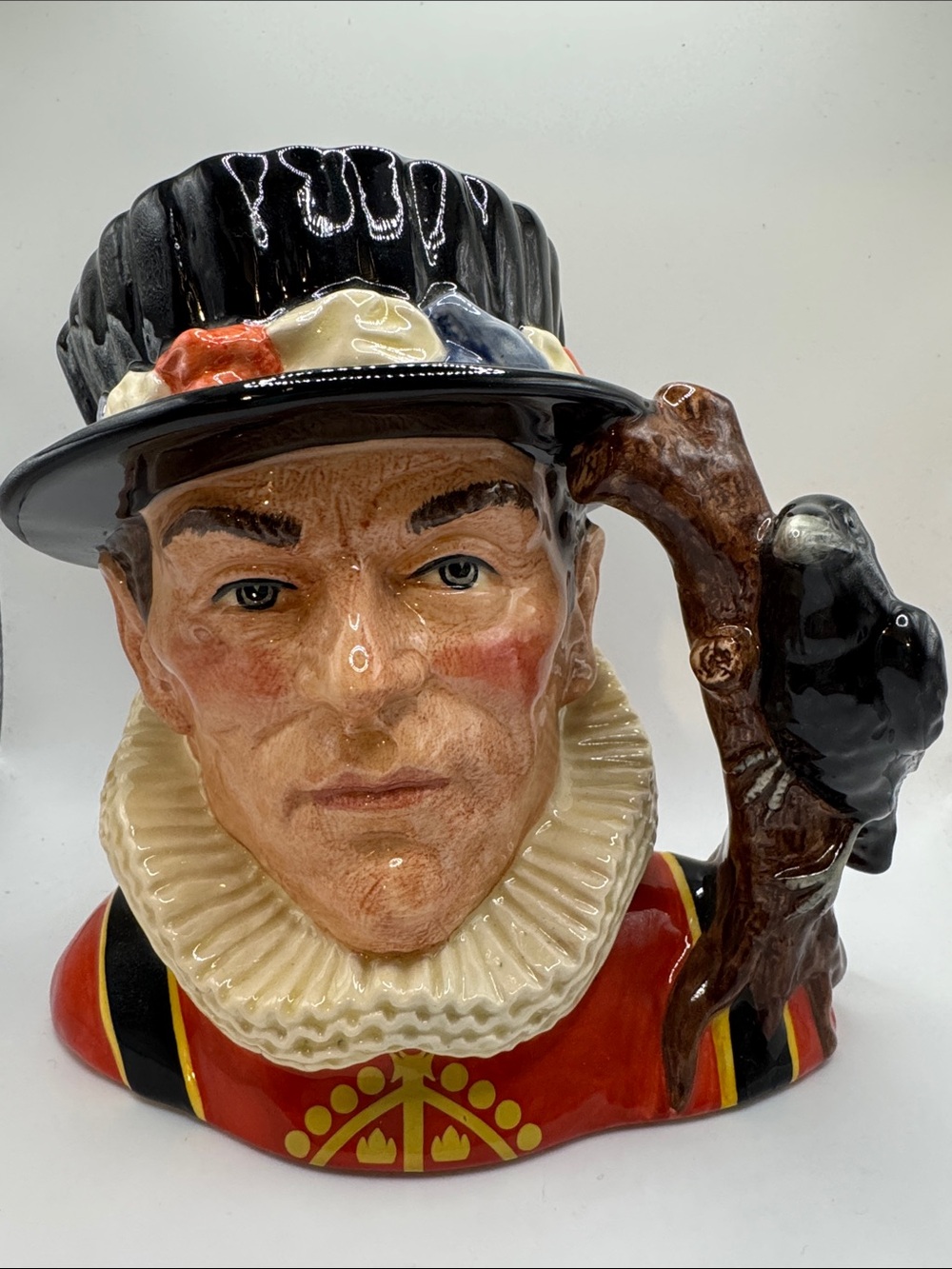 Hand-Painted Ceramic Tudor Figure Jug in Black, Red and Cream